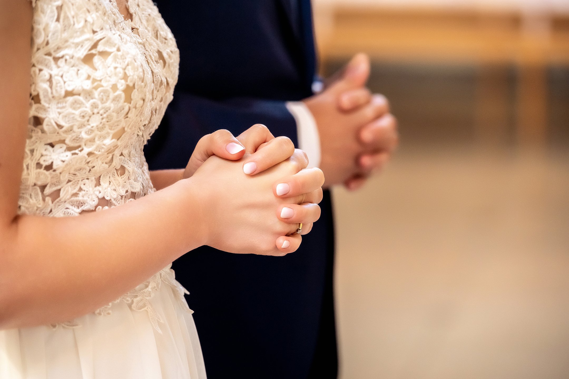 hands, wedding rings and marriage vows